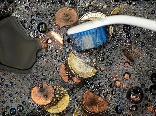 What is the best way to clean your coins?
